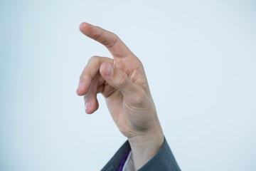 Businessman touching an invisible screen