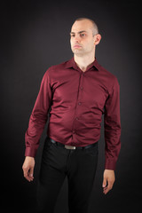 Fototapeta premium Handsome Man doing different expressions in different sets of clothes: bored