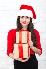 Christmas girl in santa hat  on white background.