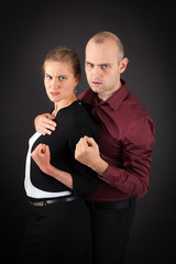 Beautiful couple doing different expressions in different sets of clothes: angry