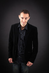 Fototapeta premium Handsome man doing different expressions in different sets of clothes: love