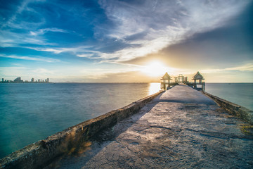 Beautiful sunset sky over jittapawan baddish Temple on the sea, Thailand landmark