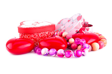 Red heart candles, necklaces and gift boxes