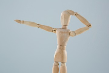 Wooden figurine shocked and pointing