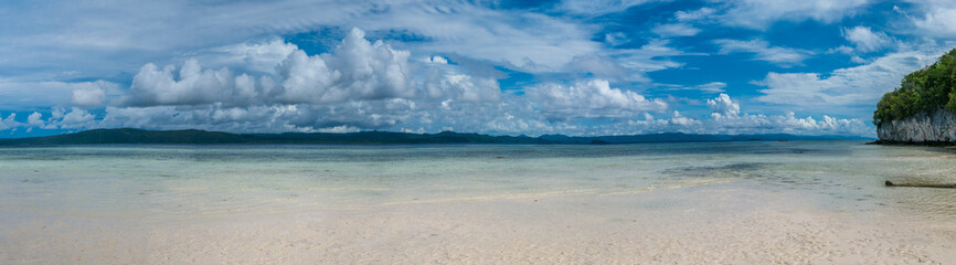 Beach on Kri Island, Gam in Background, Raja Ampat, Indonesia, West Papua.