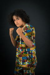 Handsome boy doing different expressions in different sets of clothes: boxe