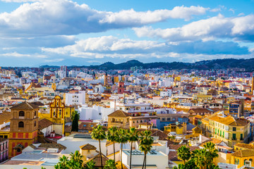 aerial view of the spanish city malaga and rooftops of the old town and adjacent residential district - obrazy, fototapety, plakaty