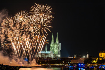 Fireworks over Cologne/ Germany at  the River Rhine with the Cathedral in background. 