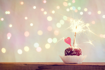 valentine's day cake with heart and sparkler, retro style