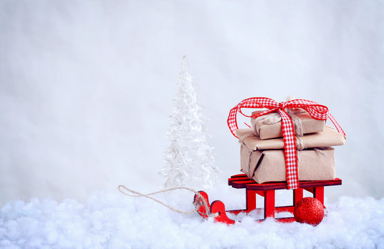 Red Toy Sled With A Pile Of Gifts, Christmas Bal