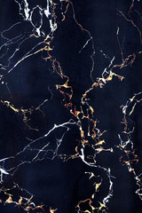 Fototapeta premium Plate of dark blue marble with cracks