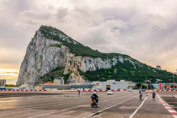 people are crossing border between spain and gibraltar during early morning