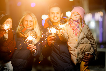 Couple with children in Christmas