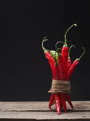 Delicious chilies on a wooden table