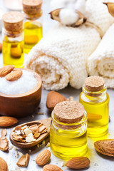 Obraz na płótnie Canvas Natural sweet almond essential oil for beauty and spa