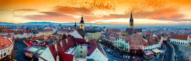 Foto op Aluminium Panoramic view of Sibiu central square in Transylvania, Romania. City also known as Hermannstadt. Sunset HDR hi-resolution photography. © Calin Stan