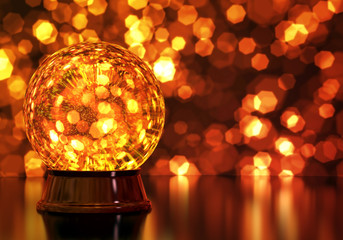 Magic ball, crystal globe on golden festive background