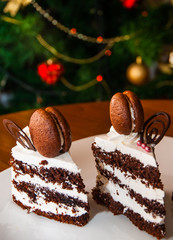 cake on table against the background of Christmas tree