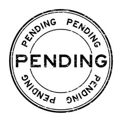 Grunge black pending round rubber stamp for business , decision