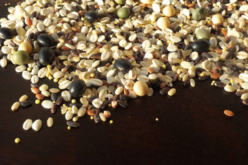 Fototapeta premium Cereals and beans on wood background