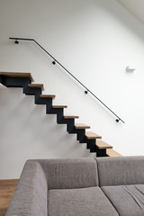 Hardwood stairs in modern living room