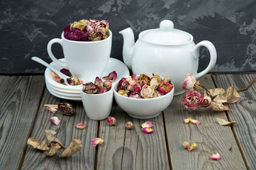 arrangement of roses and cups