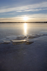 Beautiful winter evening at the lake in Finland.