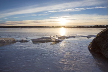 Beautiful winter evening at the lake in Finland.