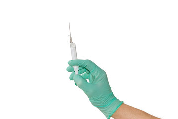 Medical syringe in a male hand wearing a medical glove