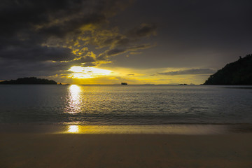 the silhouette of boat in the sea with dramatic tone