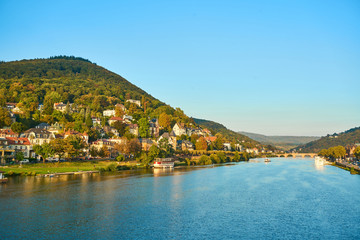 Fototapeta na wymiar city view with river Neckar, mountains and houses in Heidelberg, Baden Baden, Germany