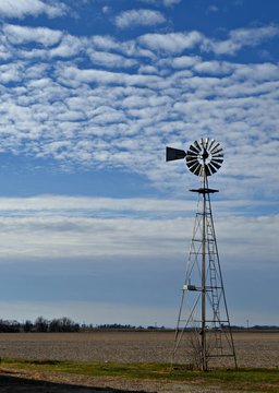 The Windmill on the Farm, Surrounded by Clouds