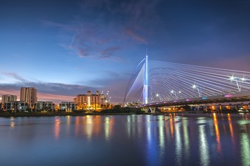 colorful of modern bridge design during bluehour