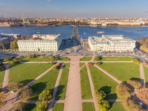 Russia, Saint-Petersburg, 24 October 2016: Aerial view of autumn panorama field of Mars, Trinity bridge, Peter and Paul fortress, roofs, Summer garden, shadows of trees, Neva river