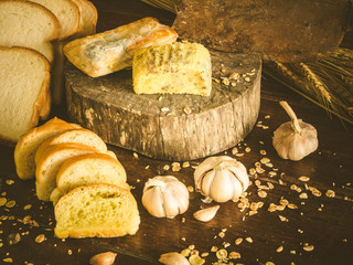 Unhealthy garlic bread and cakes