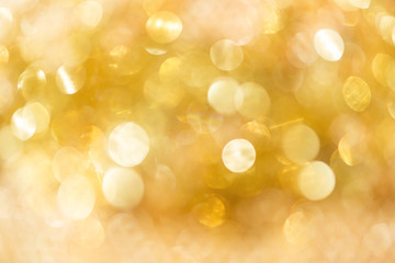 Abstract bright gold bokeh background