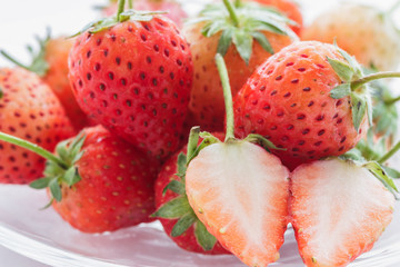 Fresh strawberries in glass bowl