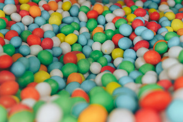 Pile of delicious colorful milk chocolate candies with th