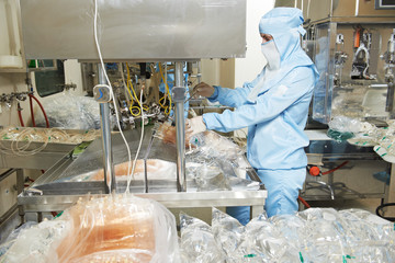 Pharmaceutical industry. physiological solution production. worker operating machine