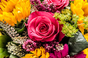Bouquet of sun flowers and roses