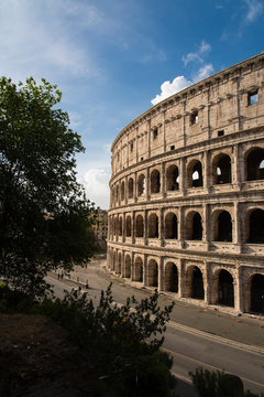 Vertical detail of Roman Coliseum on the right of the image 