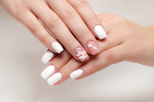 Wedding manicure with delicate white dove on long square nails