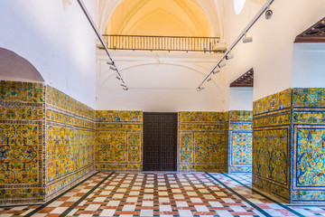 view of a decorated chamber of the real alcazar palace in the spanish city sevilla.