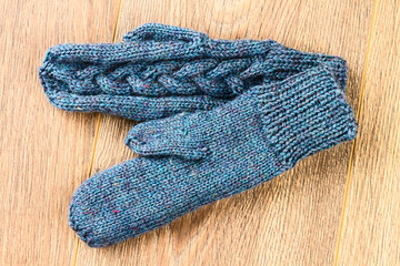 Fototapeta na wymiar gray knitting mittens