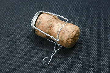 champagne cork on black