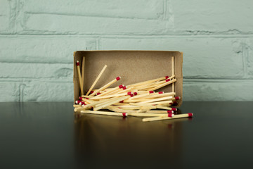 Matches spilling out of box.