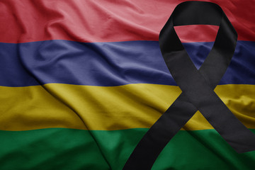 flag of mauritius with black mourning ribbon