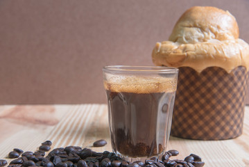 espresso in a glass on wooden table