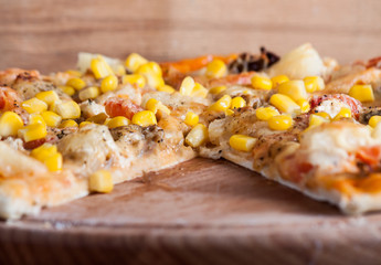 Fresh pizza isolated on wood desk