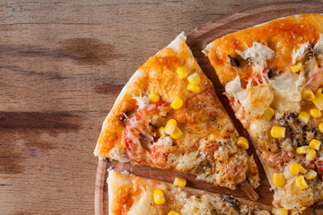 Fresh pizza isolated on wood desk